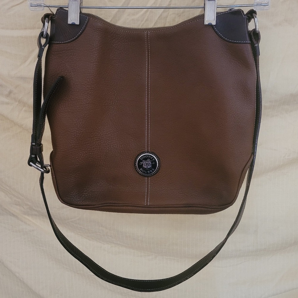 Dooney & Bourke Leather shoulder bag w/ Long adjustable strap. Like new